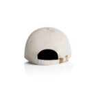 Back view of a beige baseball cap with an adjustable strap and gold buckle.