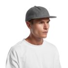 Man wearing a gray cap and white shirt looking to the side on a white background.