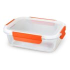 Rectangular glass food container with orange clips on the lid.