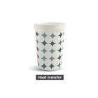 Cup with white and blue circle pattern above Heat transfer label.