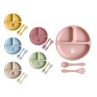Colorful divided plates with matching forks and spoons for children, arranged on a white background.