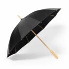 Black umbrella with a wooden handle and ribs, angled on a white background.