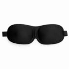 Black sleep mask with contoured eye cups and an adjustable elastic strap.