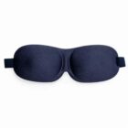 A black sleep mask with a contoured design.