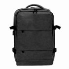 A black rectangular backpack with multiple zippers and a top handle.