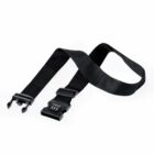 A black luggage strap with a combination lock, lying flat on a white background.