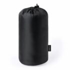 Black drawstring nylon sack on plain background.