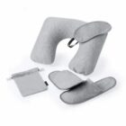 Gray travel set with neck pillow, eye mask, slippers, and a drawstring pouch.