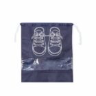 Blue shoe bag with drawstring and sneaker illustration.