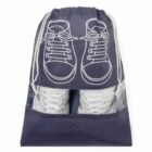 Gray drawstring bag with a sneaker design and a transparent window showing white shoes inside.