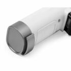VR controller close-up with a gray cap on a white handle.