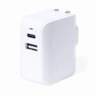 White dual-port USB wall charger with foldable prongs.