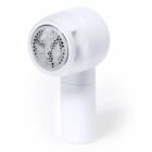 White fabric shaver with a circular blade and a transparent cover.