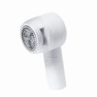 White fabric shaver with a round head and handle on a white background.