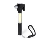 Black flashlight with an emergency glass breaker and a wrist strap.
