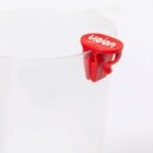 Clear container with a red clip labeled UNION attached to its rim.