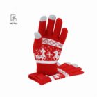 Red winter gloves with white reindeer pattern and gray touchscreen fingertips.
