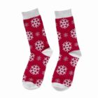 Red socks with white snowflake patterns and white heels, toes, and cuffs.