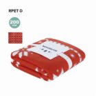 Folded red and white snowflake blanket labeled WONDERLAND, with a 200 GSM mark.