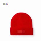 Bright red beanie hat for kids, displayed on a plain white background.