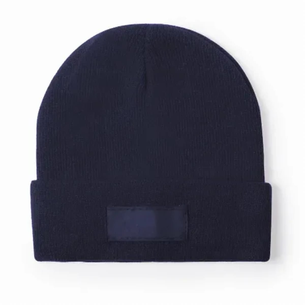 A plain navy blue knit beanie with a folded brim and a blank patch on the front.