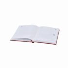 An open planner with blank pages, lying flat on a white background.