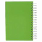 A green spiral-bound notebook with a plain cover.