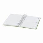 An open spiral-bound planner showing blank pages with dates and lines for writing.