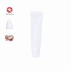 White cosmetic tube with images showing vanilla scent and application on hand.