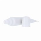 White plastic squeeze tube with a removed cap lying beside it on a white background.