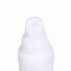 Close-up of a white plastic squeeze bottle with an open nozzle against a white background.