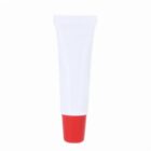 A white squeezable tube with a red cap, standing upright on a white background.