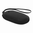 A black, oval-shaped electronic device with a wrist strap attached.