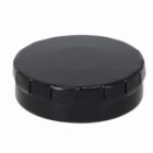 A black hockey puck on a white background.