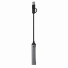 A slim USB device with a long black cable and a rectangular metallic end.