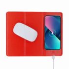 Red wireless charging pad charging a smartphone and holding a white wireless mouse.