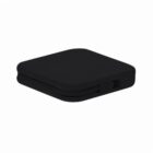 A closed, black, square-shaped compact case with rounded corners.