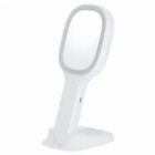 A white handheld mirror with a stand, shown against a plain white background.