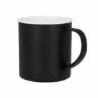 Black mug with a white rim and handle, shown against a plain white background.