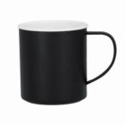 Black mug with a white interior and a handle, shown on a plain white background.