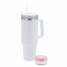 Tall white tumbler with handle, clear lid, straw, and a separate pink-tinted lid nearby.