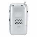 Back view of a silver portable radio with a speaker grill and a small antenna.