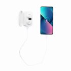 White wireless earbuds case charging a smartphone with a white USB cable.