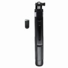 Black selfie stick with a detachable remote control on a white background.