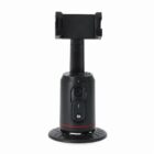 Black automatic phone holder with camera sensor on a circular base, against a white background.