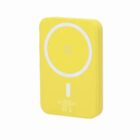 A yellow rectangular wireless charger with a white circular design on the front.