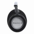 Black portable speaker with a looped strap and the word MUSIC printed on the end.