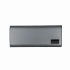 A gray rectangular portable power bank with a small black display on one side.