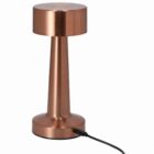 Copper-colored table lamp with a modern design, connected to a black charging cable.