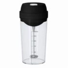 Clear shaker bottle with black lid and measurement markings, featuring a mixing mechanism inside.